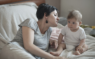 Image showing mother is playing with baby at home