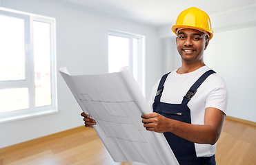 Image showing happy indian builder in helmet with blueprint