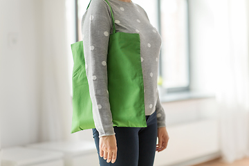 Image showing woman with reusable canvas bag for food shopping