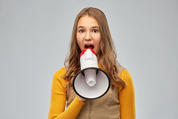 Image showing teenage girl speaking to megaphone