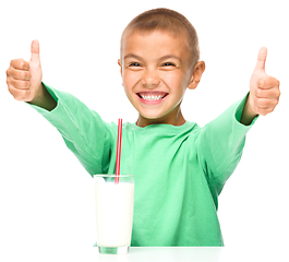 Image showing Cute boy with a glass of milk