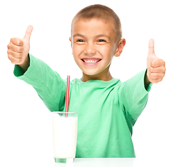 Image showing Cute boy with a glass of milk