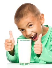 Image showing Cute boy with a glass of milk