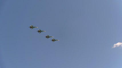 Image showing Four bombers Su-34 fly in blue sky