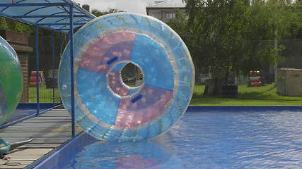 Image showing Plastic zorbing ball on the lake water