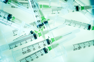 Image showing Syringes on blue background