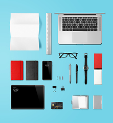 Image showing Office desk branding mockup top view isolated on blue