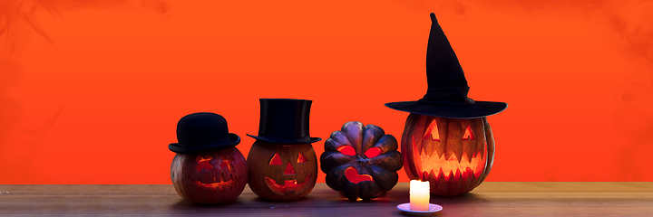 Image showing Scary pumpkins on black background, the night of fear