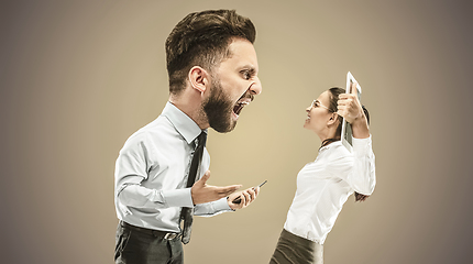 Image showing Angry business man screaming at employee in the office