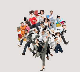 Image showing Office workers or ballet dancers jumping on white background