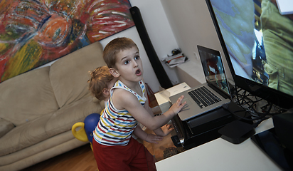 Image showing Little child playing with sister at home