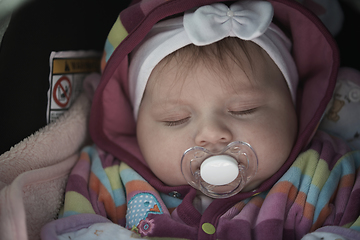 Image showing newborn baby sleeping at home in bed