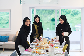 Image showing Young muslim women preparing food for iftar during Ramadan