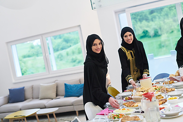 Image showing Young muslim women preparing food for iftar during Ramadan