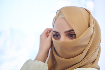 Image showing Portrait of young girl with niqab on face