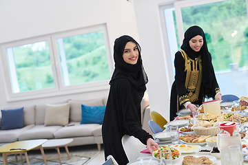 Image showing Young muslim women preparing food for iftar during Ramadan