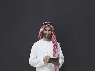 Image showing Portrait of young muslim businessman using tablet