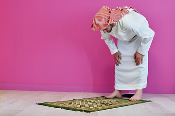 Image showing Young muslim man praying salat during Ramadan