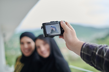 Image showing Portrait of young muslim women on the balcony