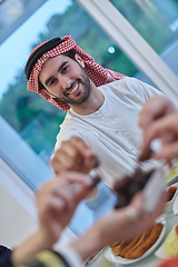 Image showing Muslim family having iftar together during Ramadan.