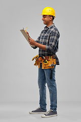 Image showing happy builder with clipboard and pencil