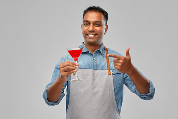 Image showing indian barman in apron with glass of cocktail