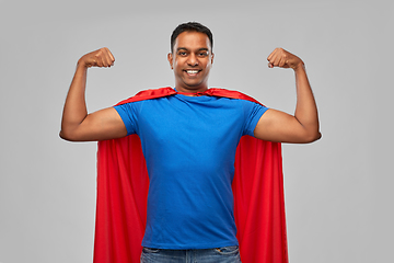 Image showing indian man in superhero cape showing his power