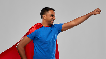 Image showing indian man in superhero cape makes winning gesture