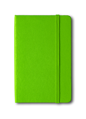Image showing Green closed notebook isolated on white