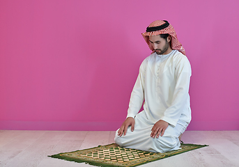 Image showing Young muslim man praying salat during Ramadan