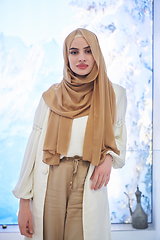 Image showing Girl wearing hijab posing on winter concept background