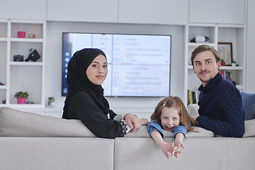 Image showing Happy Muslim family spending time together in modern home