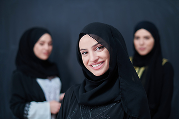 Image showing Portrait of Arab women wearing traditional clothes or abaya