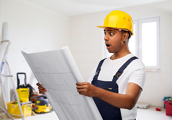 Image showing shocked indian builder in helmet with blueprint