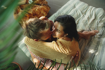 Image showing Couple of lovers at home relaxing together, comfortable