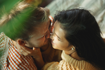 Image showing Couple of lovers at home relaxing together, comfortable