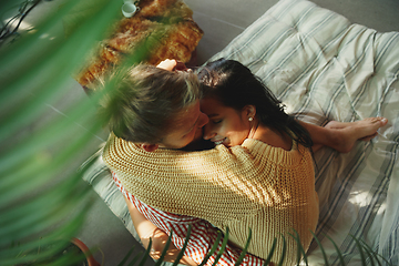 Image showing Couple of lovers at home relaxing together, comfortable