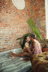 Image showing Couple of lovers at home relaxing together, comfortable