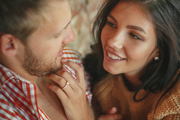 Image showing Couple of lovers at home relaxing together, comfortable