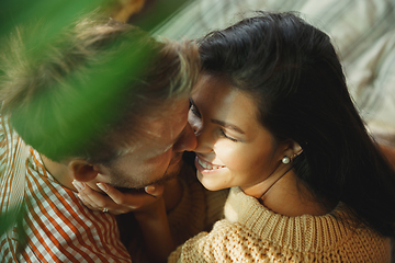 Image showing Couple of lovers at home relaxing together, comfortable