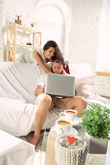 Image showing Couple of lovers at home relaxing together, comfortable