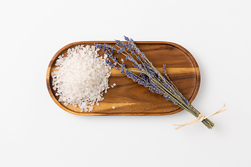 Image showing sea salt heap and lavender on wooden tray