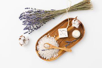 Image showing sea salt, lavender soap and moisturizer on tray