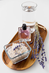 Image showing sea salt, perfume and lavender on wooden tray