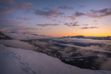 Image showing Cloudy mountain sunset in winter