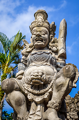 Image showing Gard statue on a temple entrance door, Ubud, Bali, Indonesia