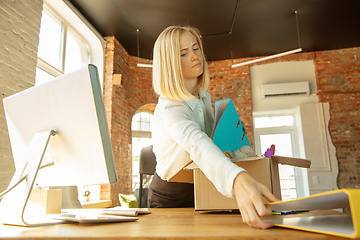 Image showing Young businesswoman fired, looks upset