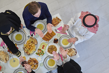 Image showing Top view of muslim family having Iftar during Ramadan holy month