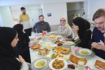 Image showing Muslim family having iftar together during Ramadan.