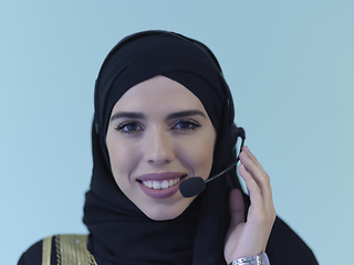 Image showing Portrait of young muslim woman with headphones